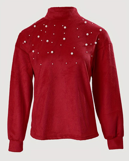 Sweter z golfem i koralikami